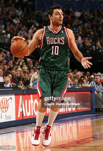 Carlos Delfino of the Milwaukee Bucks moves the ball against the Dallas Mavericks during the game at the American Airlines Center on January 26, 2010...