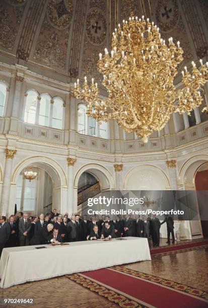 American Republican politician and 37th President of the United States, Richard Nixon , pictured on left with Alexei Kosygin as they sign a space...