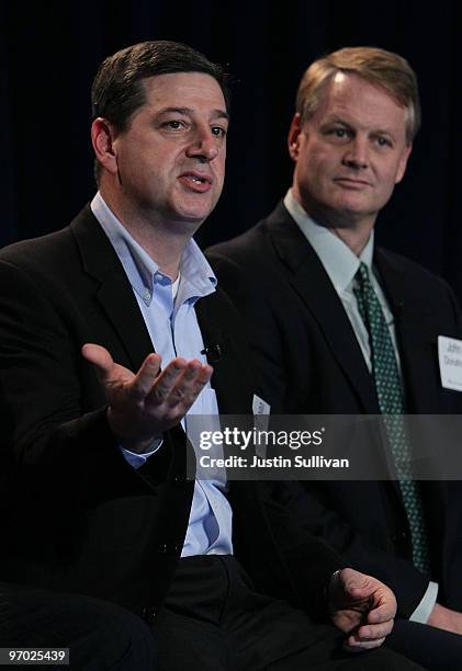 Walmart COO Bill Simon speaks as eBay CEO John Donahoe looks on during a Bloom Energy product launch on February 24, 2010 at the eBay headquarters in...