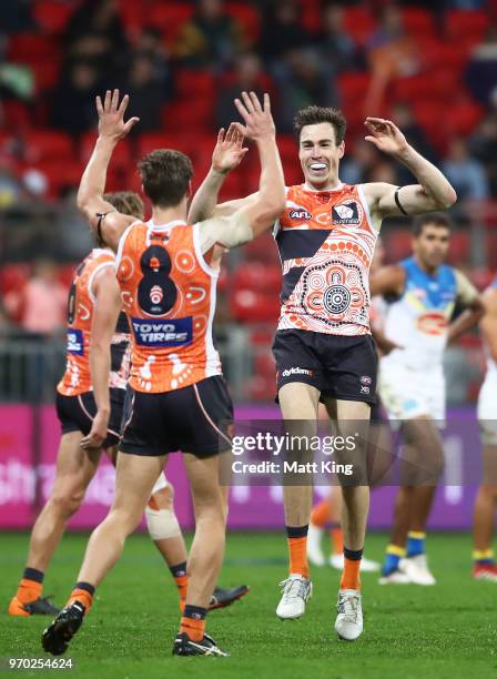 Jeremy Cameron of the Giants celebrates a goal during the round 12 AFL match between the Greater Western Sydney Giants and the Gold Coast Suns at...