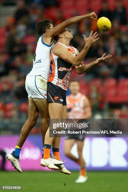 Josh Kelly of Greater Western Sydney Giants attempts a mark during the round 12 AFL match between the Greater Western Sydney Giants and the Gold...