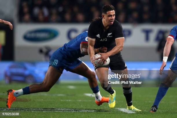 Anton Lienert-Brown of the All Blacks is tackled during the International Test match between the New Zealand All Blacks and France at Eden Park on...