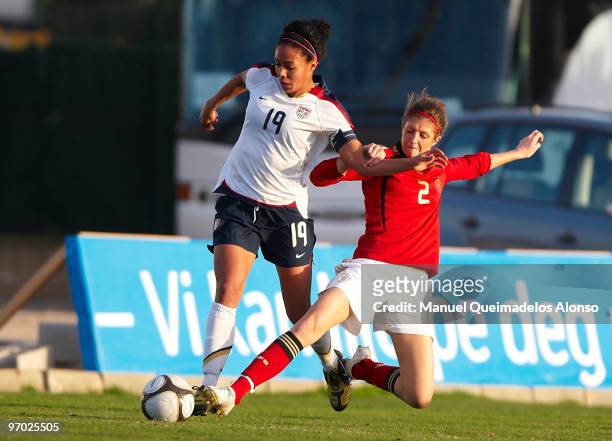 Stefanie Mirlach of Germany and Sidney Leroux of USA compete for the ball during the Women's international friendly match between Germany and USA on...