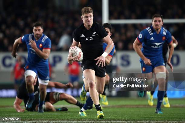 Jordie Barrett of the All Blacks makes a break during the International Test match between the New Zealand All Blacks and France at Eden Park on June...