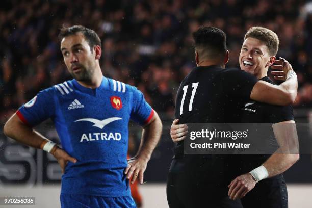 Beauden Barrett of the All Blacks celebrates scoring a try with Rieko Ioane of the All Blacks during the International Test match between the New...