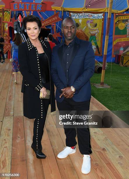 Kris Jenner, Corey Gamble arrives at the Moschino Spring/Summer 19 Menswear And Women's Resort Collection at Los Angeles Equestrian Center on June 8,...