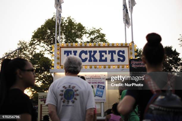 People at a small community carnaval, in Wyndmoor, PA, just outside Philadelphia, on June 8, 2018.