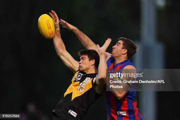 Sam Collins of Werribee and Jordan Lisle of Port Melbourne compete for the ball during the round 10 VFL match between Werribee and Port Melbourne at...