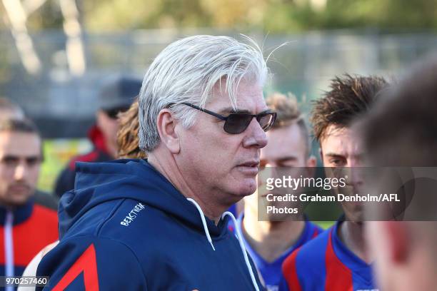 Port Melbourne Senior Coach Gary Ayres talks to his players during the round 10 VFL match between Werribee and Port Melbourne at Avalon Airport Oval...