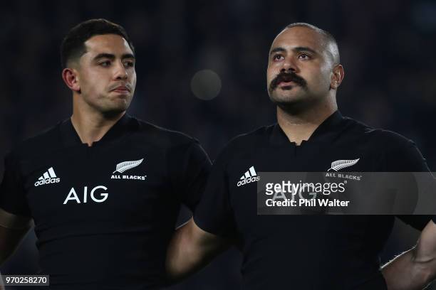 Karl Tu'inukuafe of the New Zealand All Blacks is emotional during the national anthem with Anton Leinert-Brown during the International Test match...