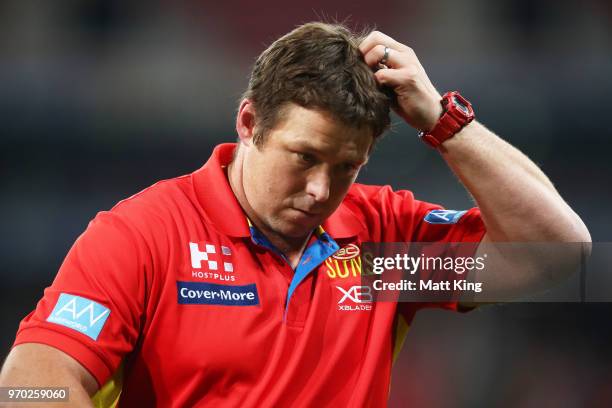 Suns coach Stuart Dew looks on during the round 12 AFL match between the Greater Western Sydney Giants and the Gold Coast Suns at Spotless Stadium on...