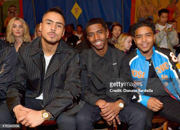 Quincy Brown, Christian Combs, and Justin Combs attend the Moschino Spring/Summer 19 Menswear and Women's Resort Collection at Los Angeles Equestrian...