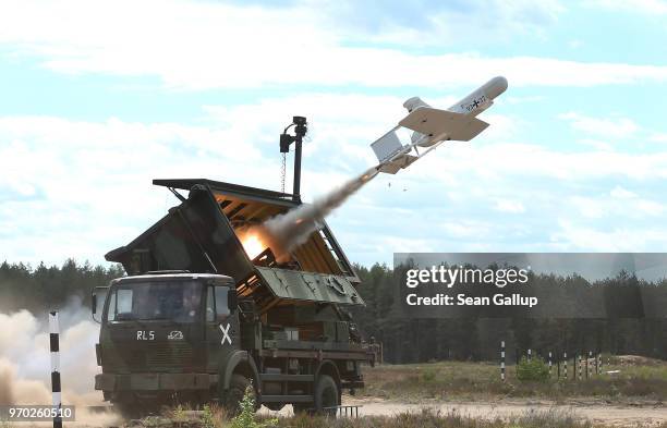 Reconaissance drone of the Bundeswehr, the German armed forces, launches with the help of a booster rocket during Thunder Storm 2018 multinational...