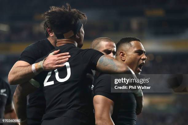 Ngani Laumape of the All Blacks celebrates scoring a try during the International Test match between the New Zealand All Blacks and France at Eden...