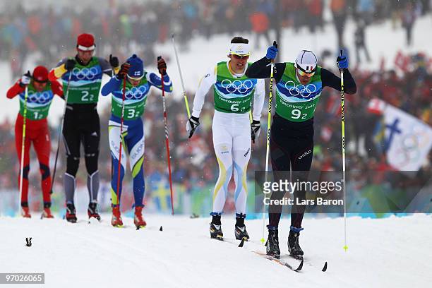 Vincent Vittoz/2 of France skis in the Classic style on the second leg during the cross country skiing men's 4 x 10 km relay on day 13 of the 2010...