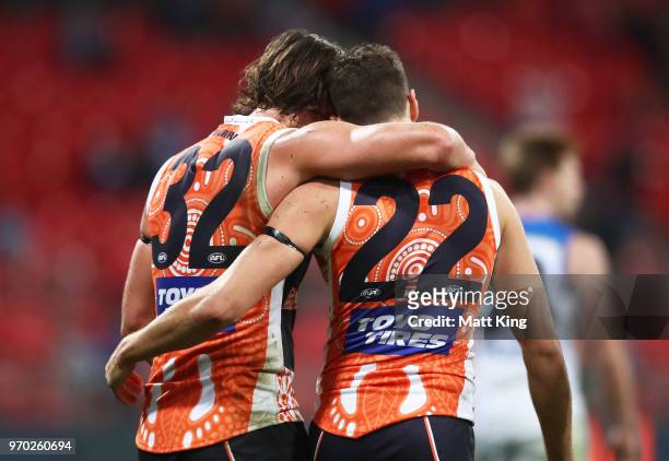Josh Kelly of the Giants celebrates with Ryan Griffen of the Giants after kicking a goal during the round 12 AFL match between the Greater Western...
