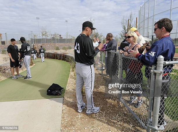 Freddy Garcia of Chicago White Sox signs autographs after a spring training workout on February 24, 2010 at the White Sox training facility at...