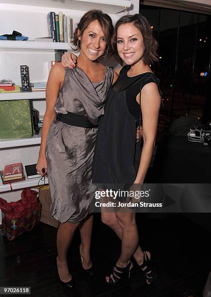 Co-owner Riawna Capri and actress Jessica Stroup pose at the Nine Zero One Salon Grand Opening and Book Party at Nine Zero One Salon on February 22,...