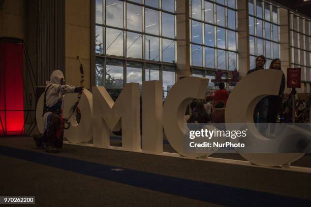 Cosplayers attend the 2018 ComicCon at Corferias in Bogota, Colombia on June 08, 2018. ComicCon Colombia arrives to Bogota as one of the most...