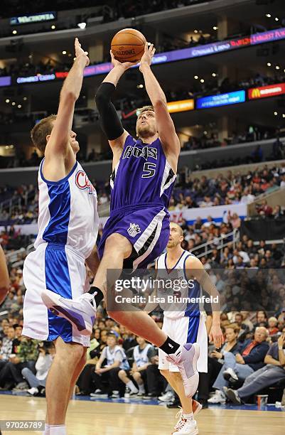 Andres Nocioni of the Sacramento Kings drives to the basket against Steve Novak of the Los Angeles Clippers at Staples Center on February 20, 2010 in...