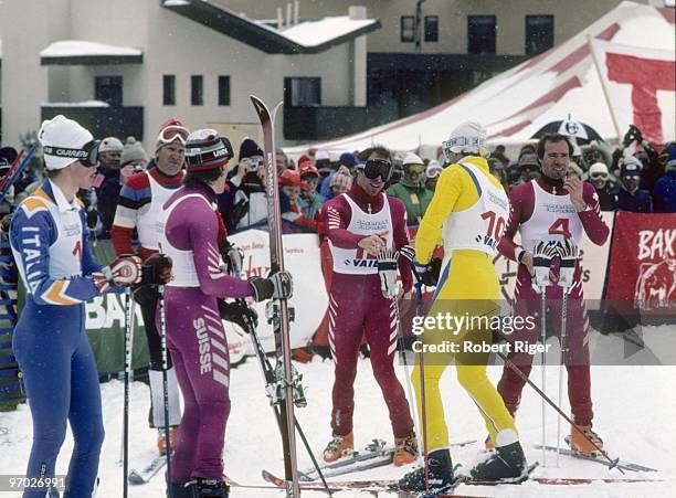 Phil Mahre shakes hands with Ingemar Stenmark as Steve Mahre looks on during the 1983 Alpine Skiing World Cup event on March 8, 1983 in Vail,...