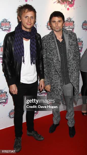 Dominic Howard and Matt Bellamy of Muse arrive at the Shockwaves NME Awards 2010 held at Brixton Academy on February 24, 2010 in London, England.