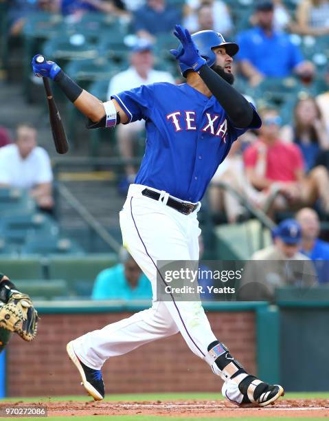 Nomar Mazara of the Texas Rangers hits in the first inning against the Oakland Athletics at Globe Life Park in Arlington on June 5, 2018 in...