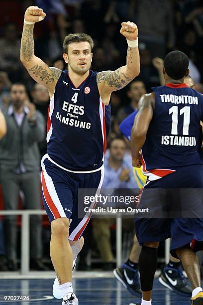 Mario Kasun of Efes Pilsen Istanbul celebrates during the Euroleague Basketball 2009-2010 Last 16 Game 4 between Efes Pilsen Istanbul and Maccabi...