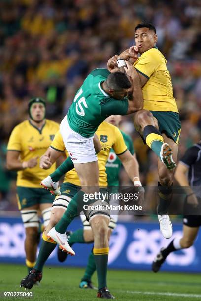 Israel Folau of the Wallabies and Rob Kearney of Ireland compete for the ball during the International Test match between the Australian Wallabies...