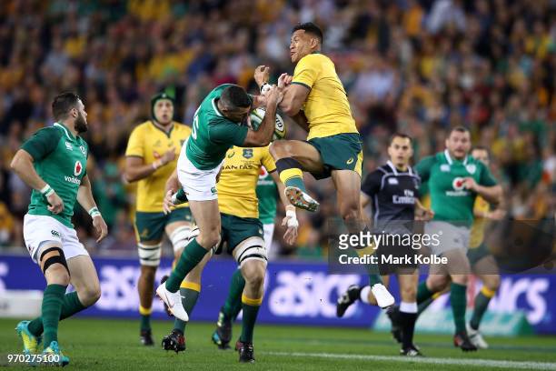 Israel Folau of the Wallabies and Rob Kearney of Ireland compete for the ball during the International Test match between the Australian Wallabies...