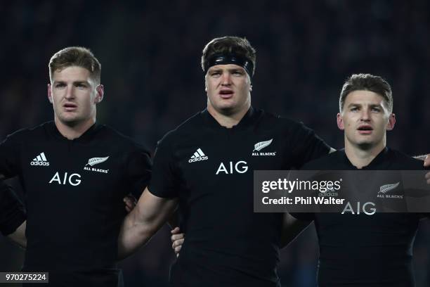 Jordie Barrett, Scott Barrett and Beauden Barrett sing the anthem during the International Test match between the New Zealand All Blacks and France...