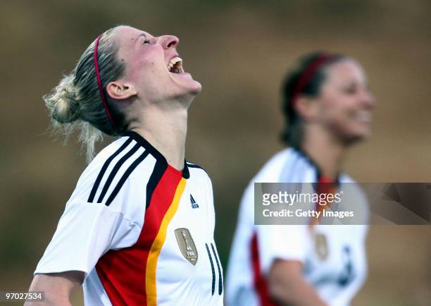 Anja Mittag of Germany celebrates scoring a goal during the Woman's Algarve Cup match between Germany and Denmark at the Estadio da Belavista on...
