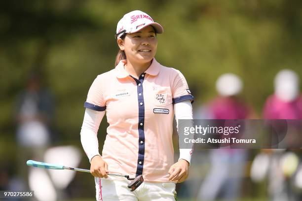 Minami Katsu of Japan celebrates after making her birdie putt on the 12th hole during the third round of the Suntory Ladies Open Golf Tournament at...