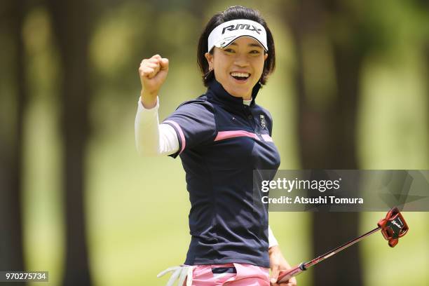 Shiho Oyama of Japan celebrates after making her birdie putt on the 5th hole during the third round of the Suntory Ladies Open Golf Tournament at the...