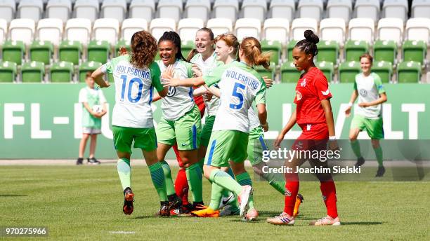 Lotta Cordes, Michelle Klostermann, Johanna Bartel, Natasha Kowalski and Lea Wohlfahrt of Wolfsburg celebrate after the goal 3:0 for Wolfsburg during...