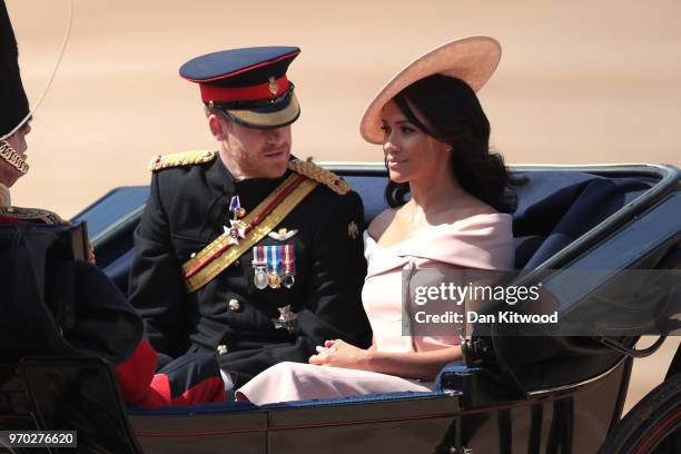 Prince Harry, Duke of Sussex and Meghan, Duchess of Sussex arrive at The Royal Horseguards during Trooping The Colour ceremony on June 9, 2018 in...