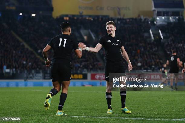 Rieko Ioane and Beauden Barrett of the All Blacks celebrate during the International Test match between the New Zealand All Blacks and France at Eden...