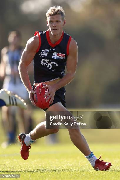 Josh Wagner of the Demons runs with the ball during the round 10 VFL match between Collingwood and Casey at Casey Fields on June 9, 2018 in...