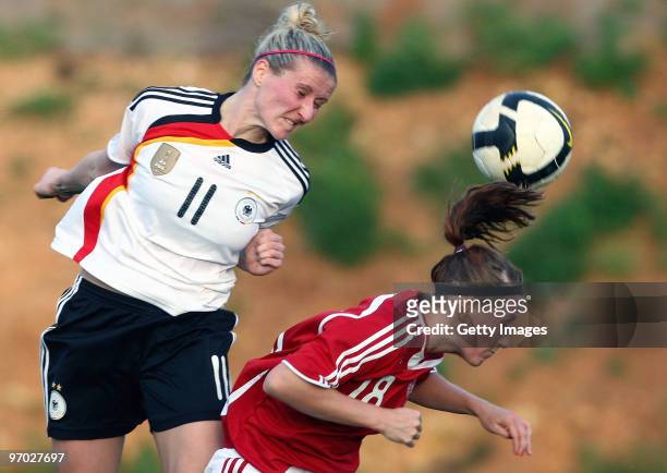 Anja Mittag of Germany and Theresa Nielson of Denmark battle for the ball during the Woman's Algarve Cup match between Germany and Denmark at the...