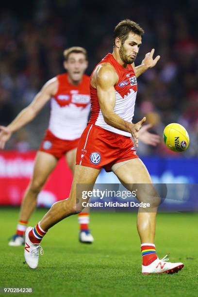 Josh Kennedy of the Swans kicks the ball during the round 12 AFL match between the St Kilda Saints and the Sydney Swans at Etihad Stadium on June 9,...