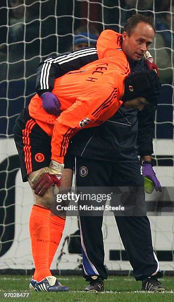 Petr Cech of Chelsea leaves the pitch with an injury during the UEFA Champions League Round of 16 first leg match between Inter Milan and Chelsea at...