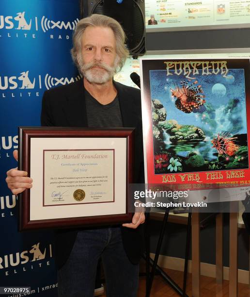 Singer/musician Bob Weir receives a plaque for his support at SIRIUS XM Studio on February 24, 2010 in New York City.