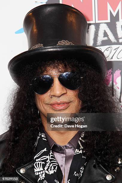 Slash poses in front of the winners boards at the Shockwaves NME Awards 2010 held at Brixton Academy on February 24, 2010 in London, England.