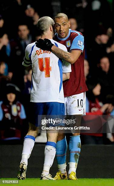 John Carew of Aston Villa consoles Shaun Derry of Crystal Palace at the end of the FA Cup Fifth Round Replay match between Aston Villa and Crystal...