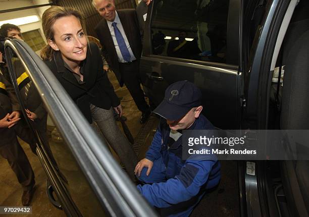 Princess Claire of Belgium visits a carwash during her visit to Atelier Saint Vincent on February 24, 2010 in Rochefort, Belgium.