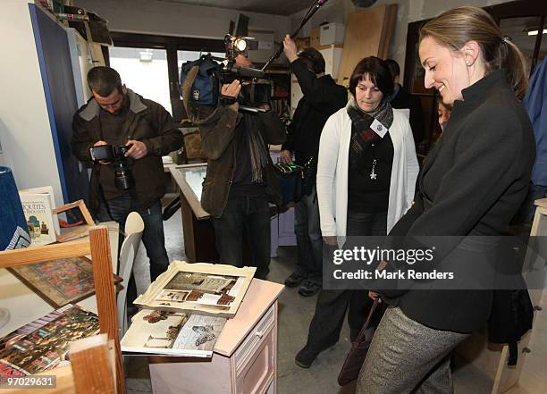 Princess Claire of Belgium visits a second hand shop during her visit to Atelier Saint Vincent on February 24, 2010 in Rochefort, Belgium.