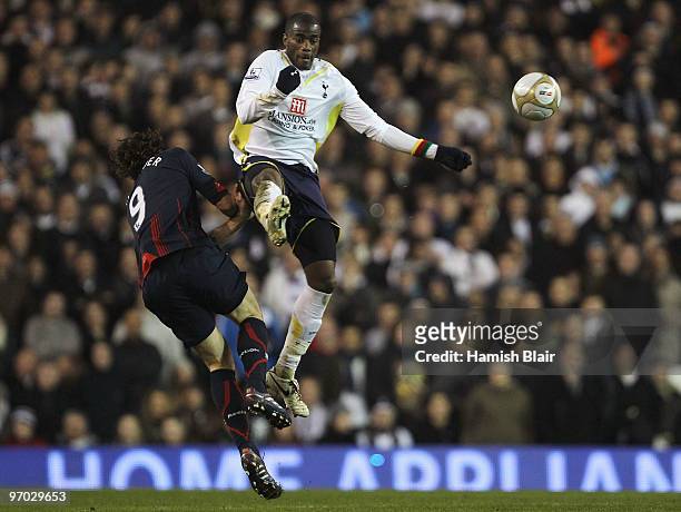 Sebastien Bassong of Tottenham in action against Johan Elmander of Bolton during the FA Cup sponsored by E.ON 5th round replay match between...
