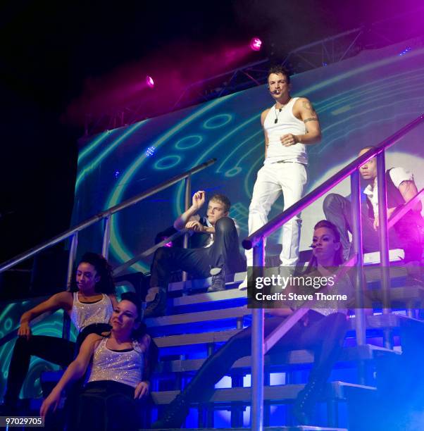 Peter Andre performs on stage at De Montfort Hall And Gardens on February 24, 2010 in Leicester, England.