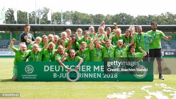 The team of Wolfsburg celebrates after the Germany U17 Girl's Championship Final match between VfL Wolfsburg and 1.FC Koeln at AOK-Stadion on June 9,...