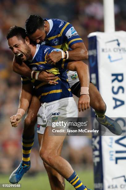 Jarryd Hayne of the Eels celebrates scoring a try during the round 14 NRL match between the Parramatta Eels and the North Queensland Cowboys at TIO...